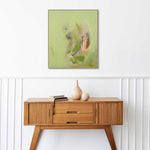 Load image into Gallery viewer, Wooden console table with decorative items and a framed abstract painting on a white wall.
