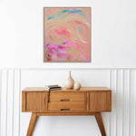 Load image into Gallery viewer, Wooden console table with decorative items against a white wall with abstract art above.
