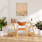 Load image into Gallery viewer, Wooden chair and table set in a room with plants and a painting on the wall.
