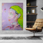 Load image into Gallery viewer, Abstract painting of a woman&#39;s face on a wall above a modern chair. The neon green original extra large painting.
