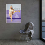 Load image into Gallery viewer, Poster painting of a woman in a dress and sunglasses on a gray wall above a chair.
