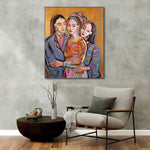 Load image into Gallery viewer, Colorful abstract painting of three women on a gray wall above a modern chair and table.
