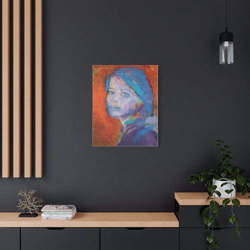 Colorful abstract painting of a woman's face on a dark wall with wooden shelves and decor.