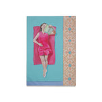 Load image into Gallery viewer, Framed artwork of a woman in a pink dress holding books on a blue background with decorative border.
