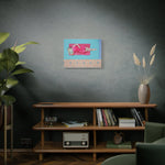 Load image into Gallery viewer, Living room with a wooden shelf, books, a plant, and a painting on a dark wall.
