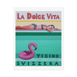 Load image into Gallery viewer, Vintage-style poster with &#39;La Dolce Vita&#39; text, woman in swimsuit, and pink flamingo float.
