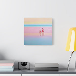 A canvas wall art print featuring a mother and daughter, standing on a beach with pastel-colored water and sky in the background. Minimalist interior white and grey