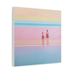 Load image into Gallery viewer, A canvas wall art print featuring two individuals, likely a mother and daughter, standing on a beach with pastel-colored water and sky in the background.
