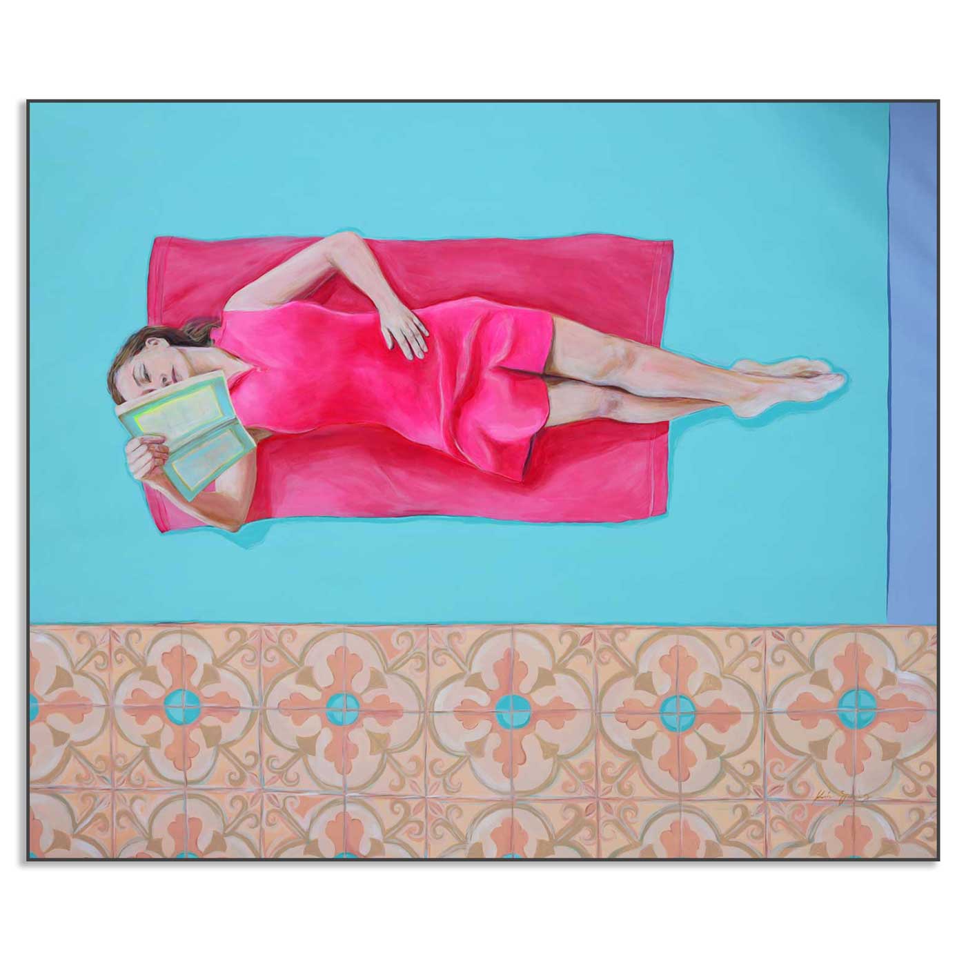 Woman in a pink dress lying on a blue surface with a patterned border at the bottom.