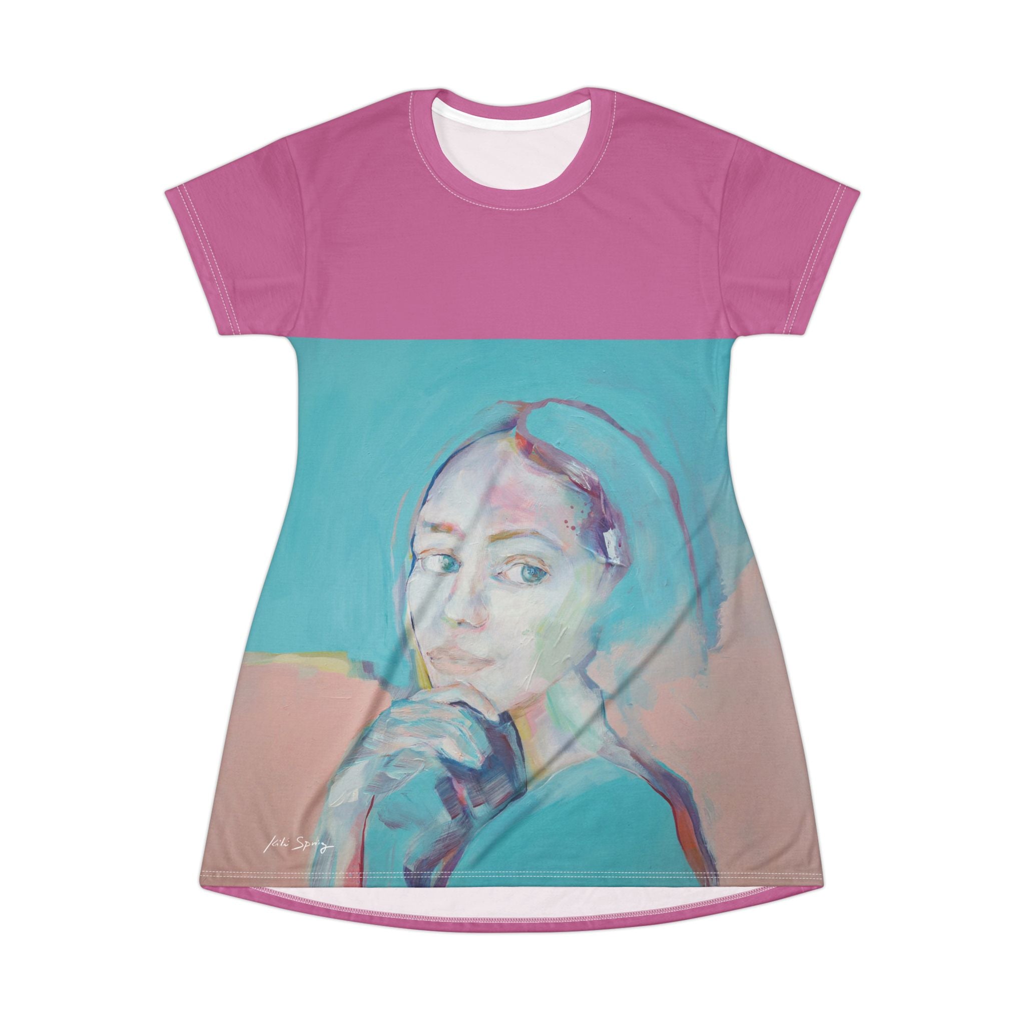 A pink t-shirt dress featuring a central female portrait print with predominantly blue and purple hues.
