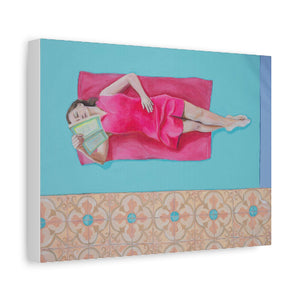 Woman in a pink dress lying on a blue surface with a book, framed with decorative border.