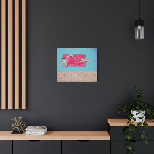 Modern interior with a painting of a woman in a pink dress on a blue background, placed above a wooden console table.