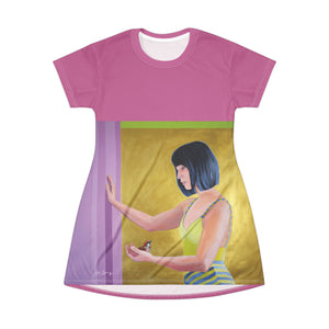 Front view of pink pop‑art T‑shirt dress by a swiss artist Kiki Spring showcasing a clean cut and relaxed fit. Comfortable artistic clothes with the portrait painting of an asian woman with a bird. 