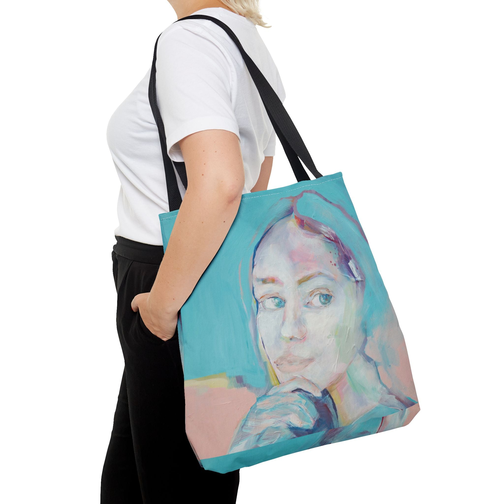 large tote bag with a printed teal portrait white woman holding her chin with a hand by kiki spring