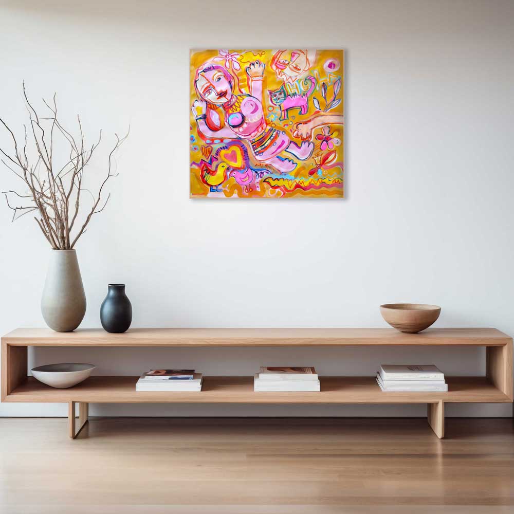 Colorful abstract painting above a wooden shelf with decorative items.