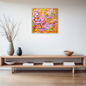 Colorful abstract painting above a wooden shelf with decorative items.