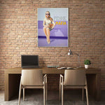 Load image into Gallery viewer, Desk with laptop and books against a brick wall with a framed poster.
