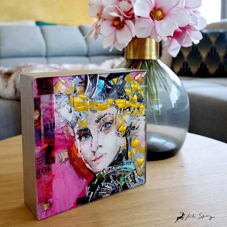 original small resin pink gold painting portrait on the wood table with rose flowers in a glass round vase mini wall decor